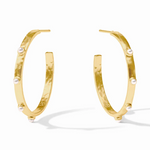 Gold hoop earrings with small white pearls