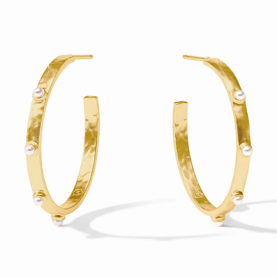 Gold hoop earrings with small white pearls