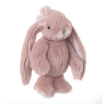 Pink plush bunny toy on a white background