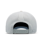 Product photograph of a Melin brand athletic snapback hat in light grey against a white studio background featuring laser-perforated ventilation panels, an adjustable grey closure, and a signature rubberized logo tag