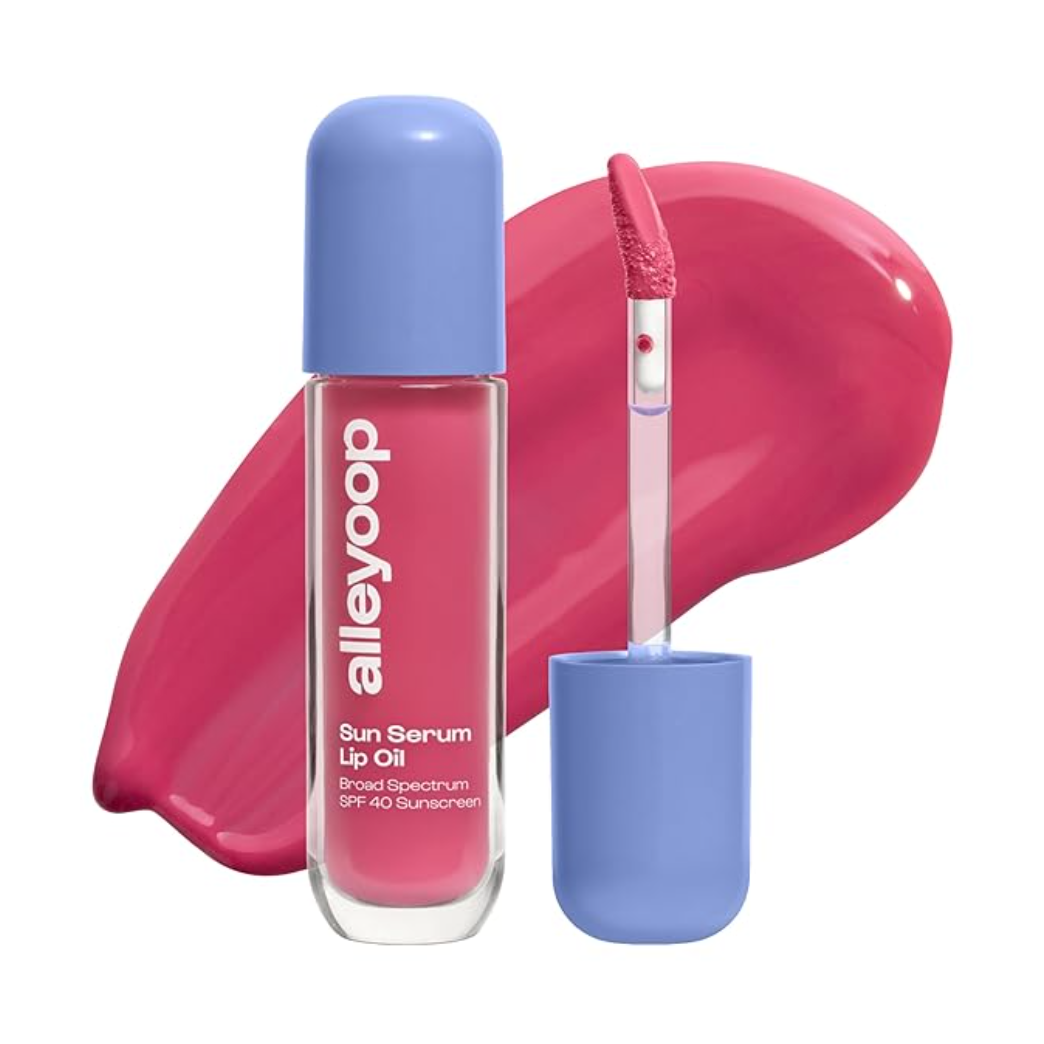 Lip oil with pink serum and blue cap on a white background