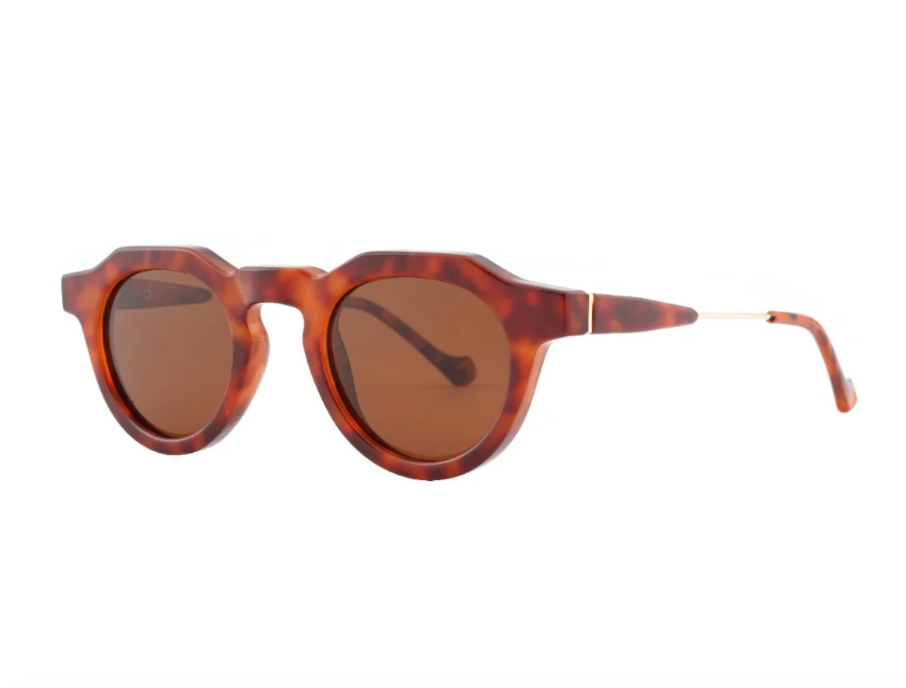 Sunglasses with tortoiseshell frame and brown lenses on a white background