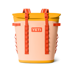 YETI backpack with orange straps and a white background