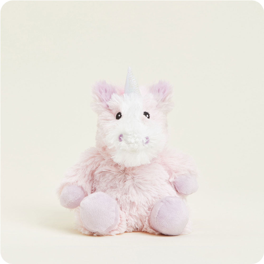 Plush pink unicorn toy with a silver horn