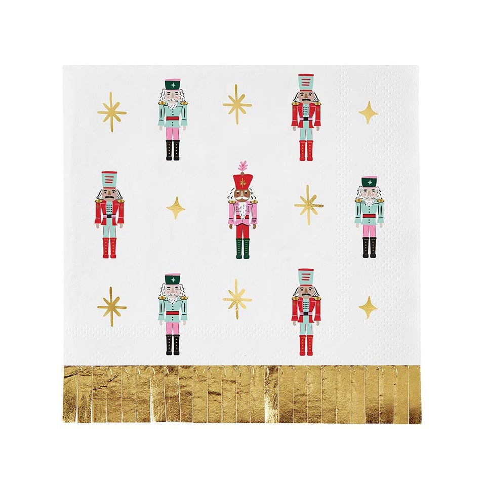 Cocktail napkin with nutcrackers, gold stars and gold foil fringe