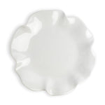 White ceramic leaf-shaped dish on a white background
