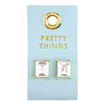 Rectangle crystal stud earrings on a light blue Pretty Things card