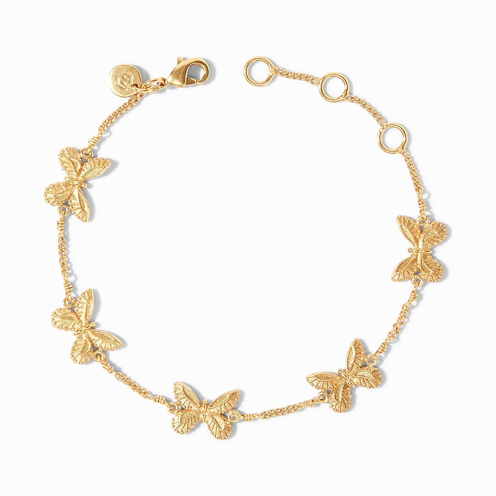 Gold chain bracelet featuring five small butterfly charms