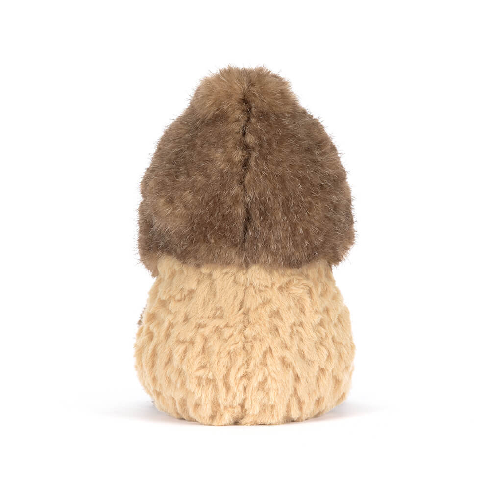 Backview of plush toy peanut wearing a yeti costume on a white background