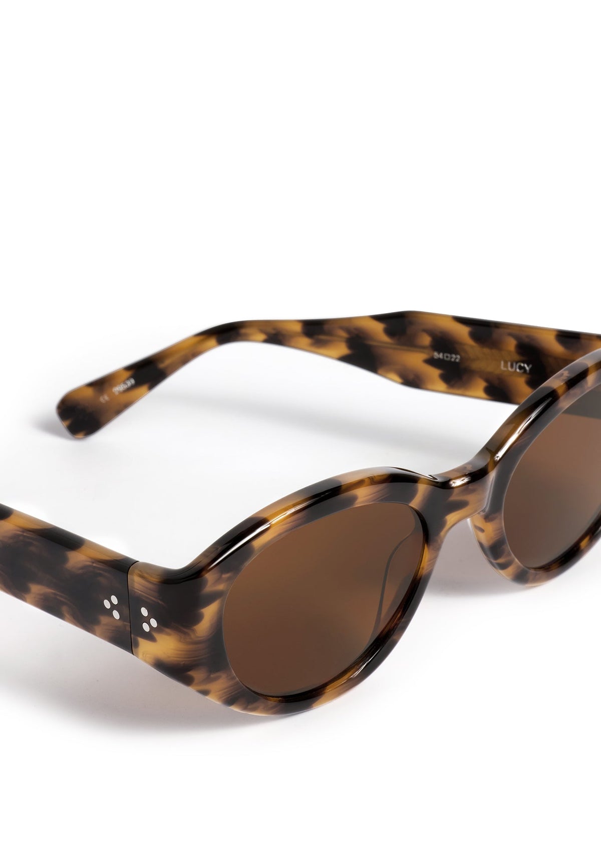 Tortoiseshell oval frame sunglasses with brown lenses