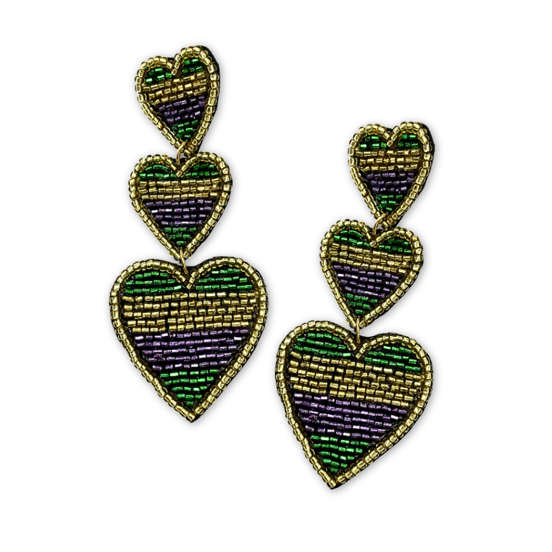 Heart-shaped beaded earrings with green, purple and gold design on a white background