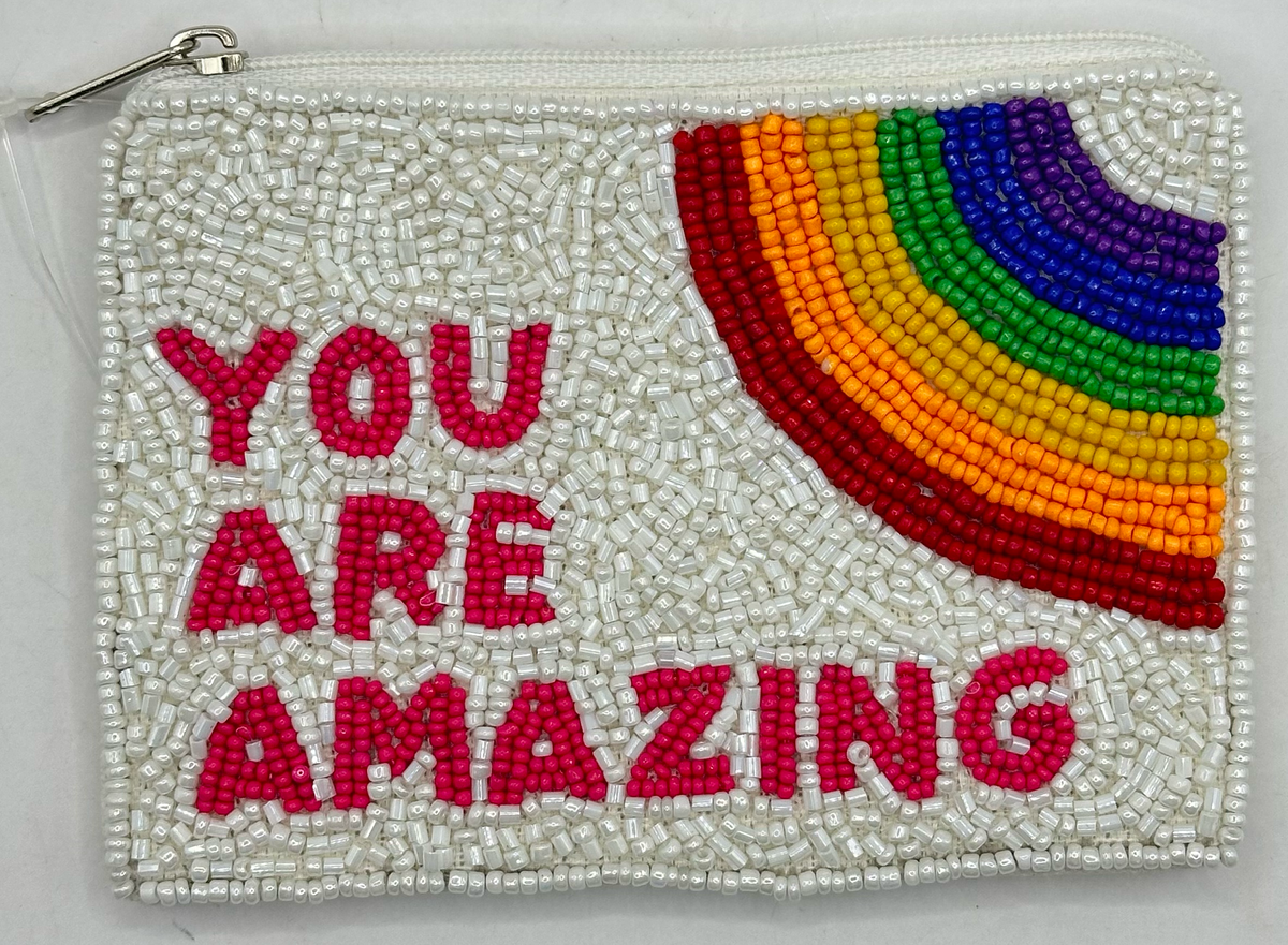 White beaded pouch reading You Are Amazing with a rainbow