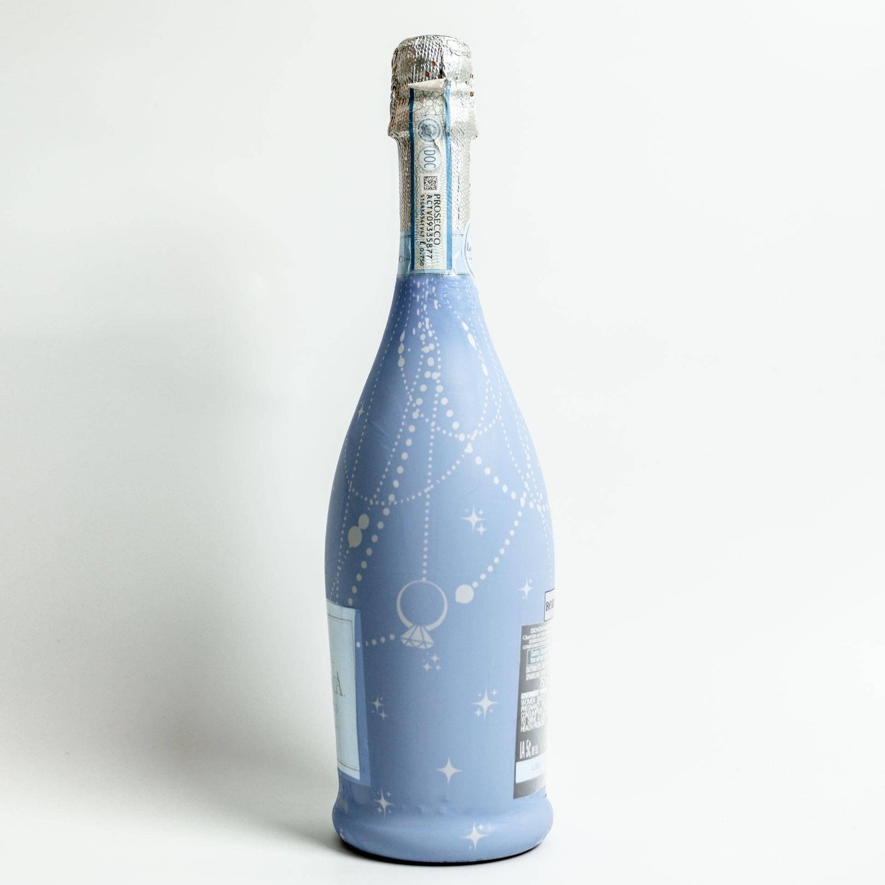 Blue bottle with star pattern on a white background