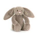 Plush bunny toy with long ears on a white background