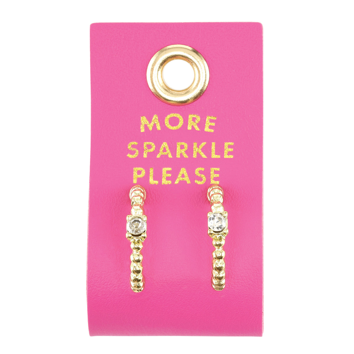 Gold hoop earrings on a pink More Sparkle Please card