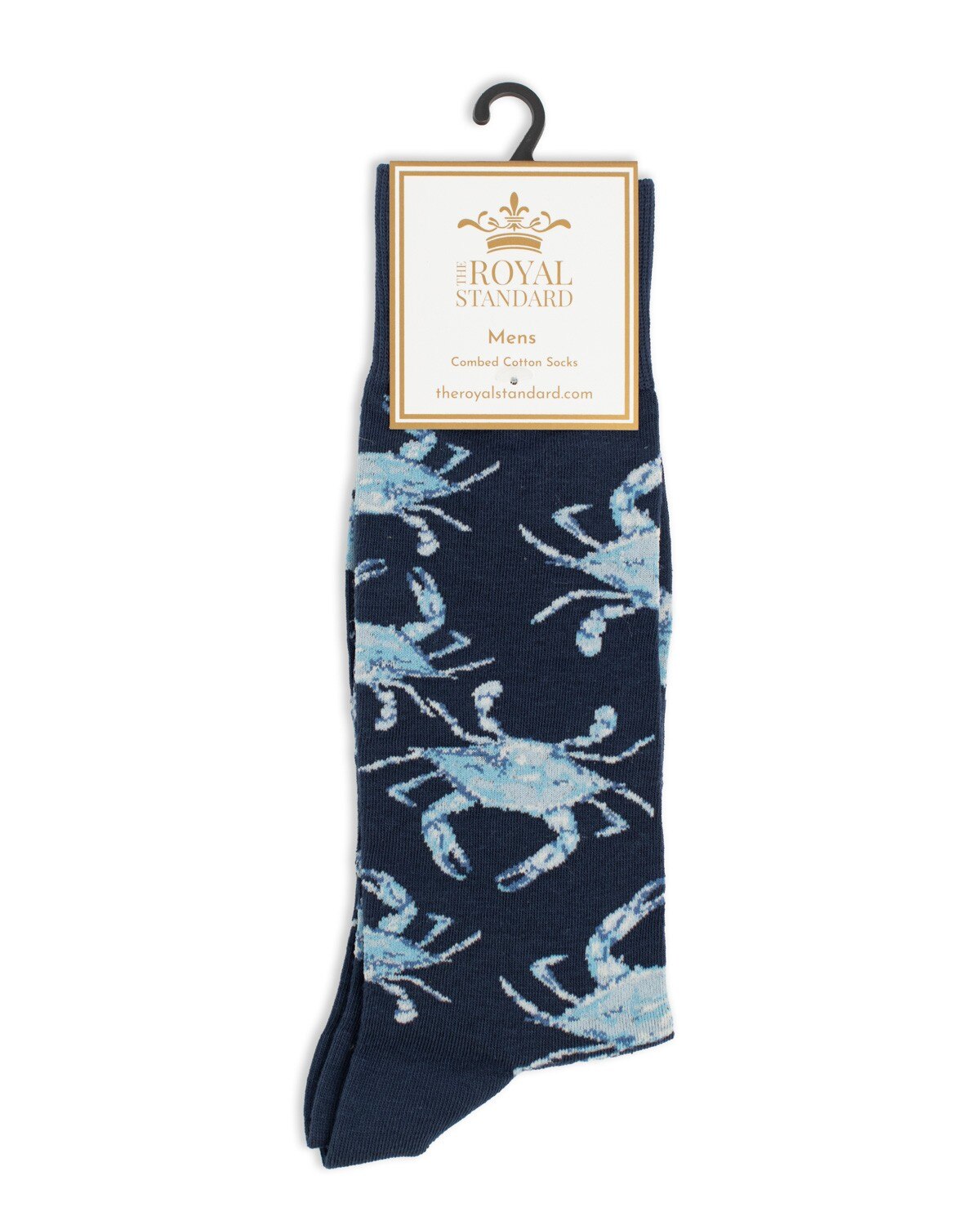 Navy socks with a blue crab print on a hanger