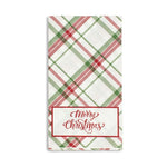 White paper napkin with red and green plaid pattern and Merry Christmas text in a red rectangular border
