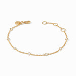 Gold chain bracelet with evenly spaced round clear stones and a lobster clasp