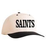 Beige baseball cap with black brim and black Saints text on front