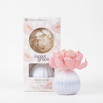 Flower diffuser with packaging labeled 'sweet grace' on a white background