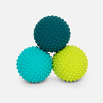 Product photograph of three textured sensory massage balls arranged in a pyramid on a white background featuring vibrant teal, light blue, and lime green colors with uniform raised nubs for tactile stimulation