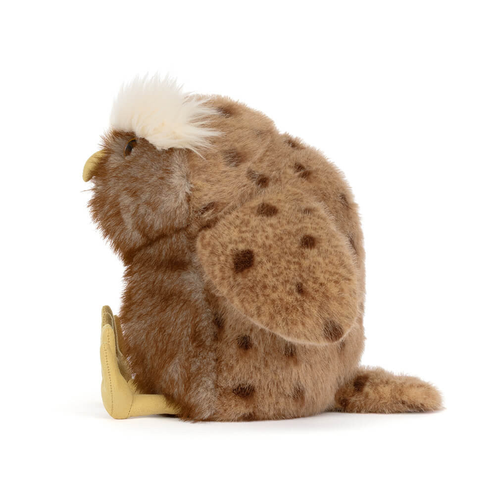 Brown spotted plush owl, side view
