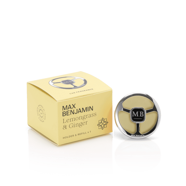 Max Benjamin Lemongrass & Ginger car fragrance box beside a round silver vent clip with a pale yellow refill