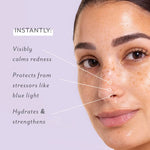 Close up of a woman face with text highlighting skincare benefits including calming redness and blue light protection