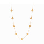 Gold chain necklace featuring evenly spaced circular coin charms with embossed cross designs