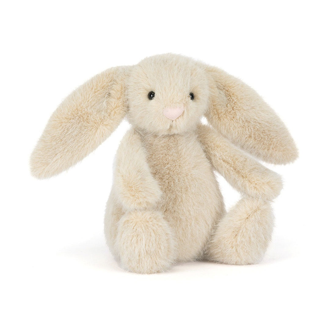 Stuffed bunny toy with long ears on a white background