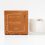 Aroma Avenue Spiced Honey candle packaging on a white background