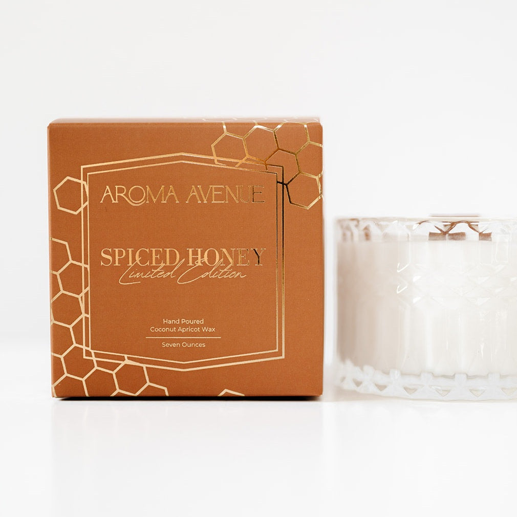 Aroma Avenue Spiced Honey candle packaging on a white background