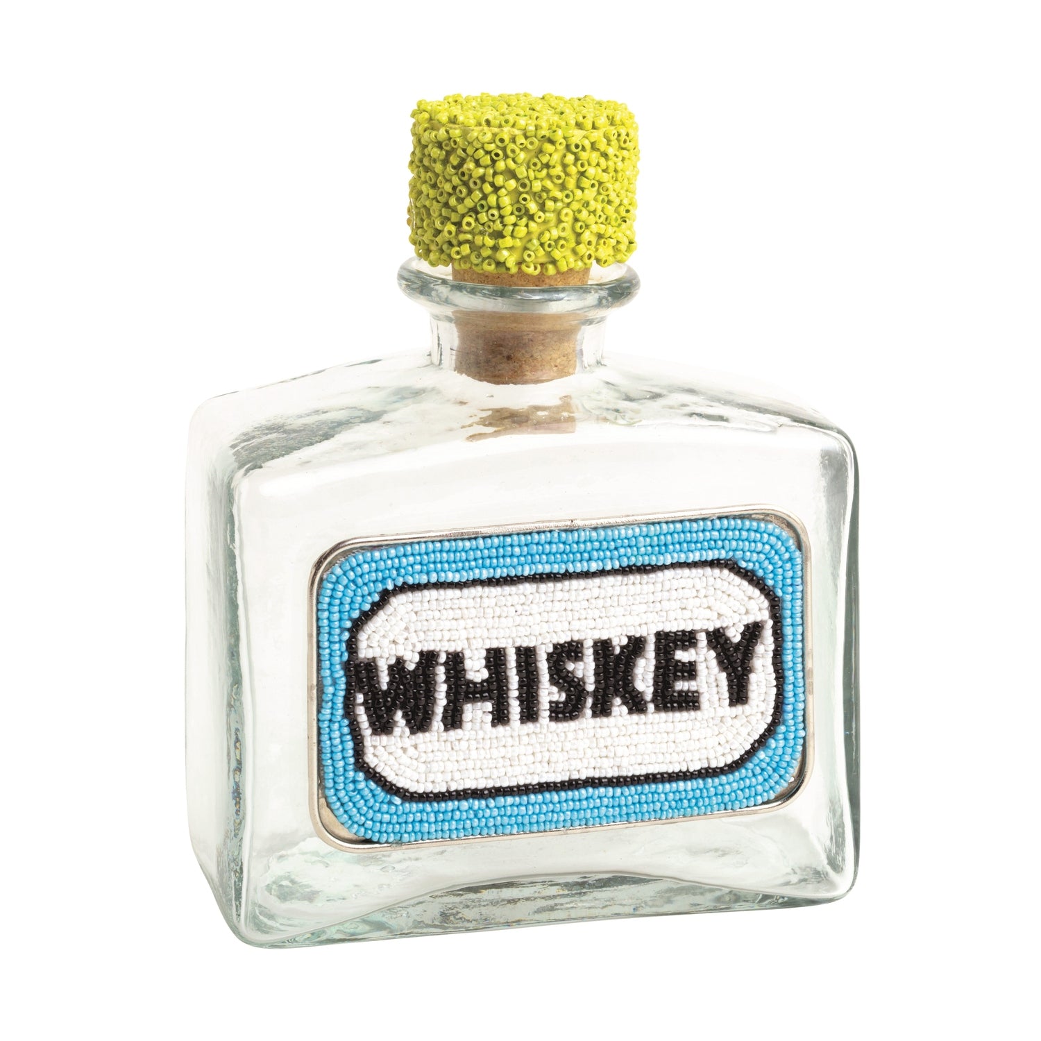 Clear glass whiskey bottle with decorative label and yellow cork on a white background