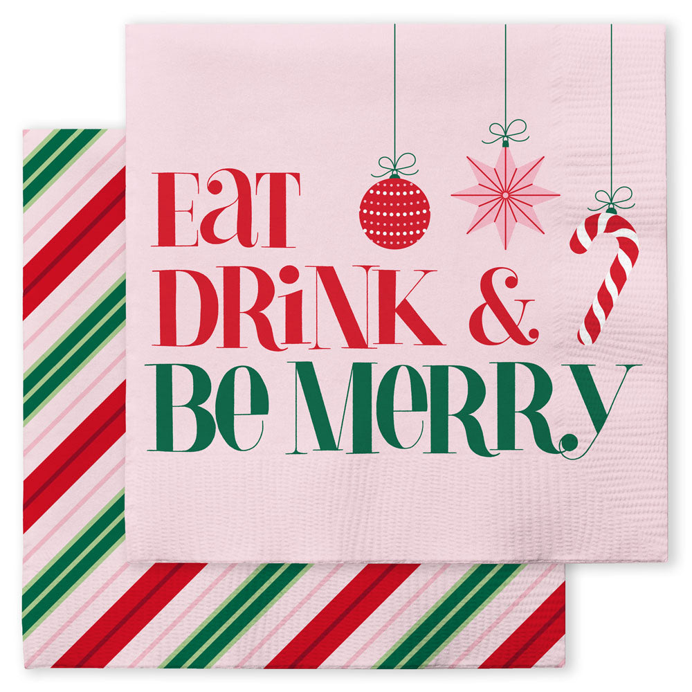 Pink cocktail napkin reading "Eat Drink & Be Merry" with ornaments, over a candy stripe napkin