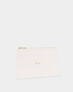 Product photograph of a Katie Loxton vegan leather clutch for a wedding bride featuring an elegant gold cursive Bride script, a shimmering gold-tone zipper, and a textured cream finish on a clean white studio background