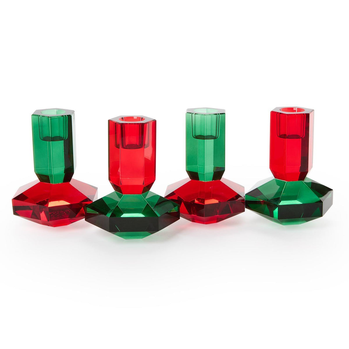 Red and green crystal taper candleholders in a row