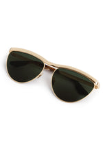 Gold-framed sunglasses with dark lenses on a white background