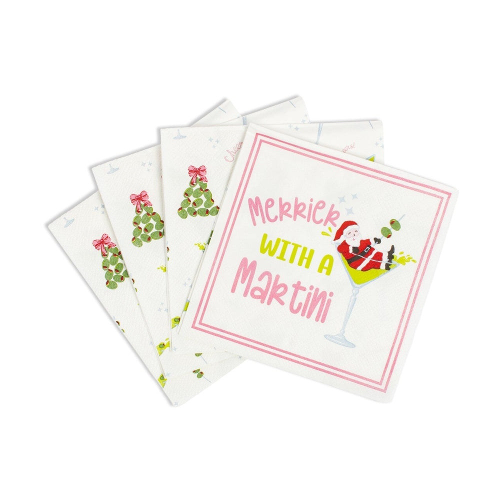 Stack of white paper napkins featuring a Santa Claus illustration in a martini glass with text