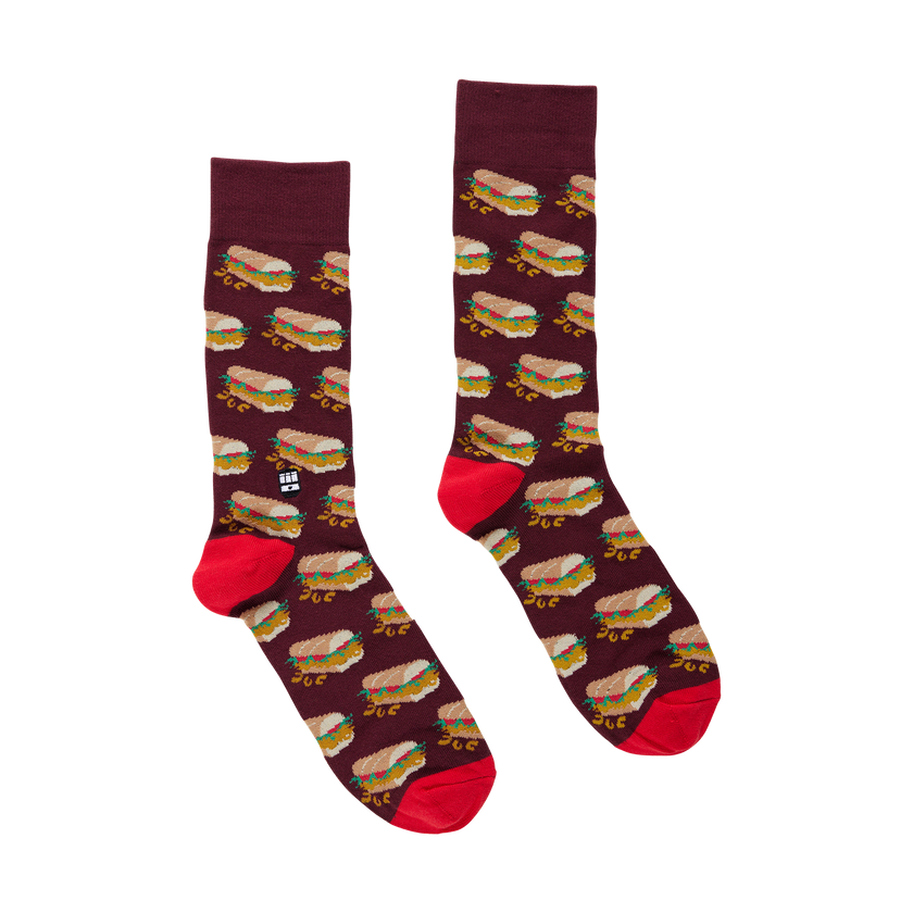 Maroon socks with poboy sandwich pattern and red toes on a white background