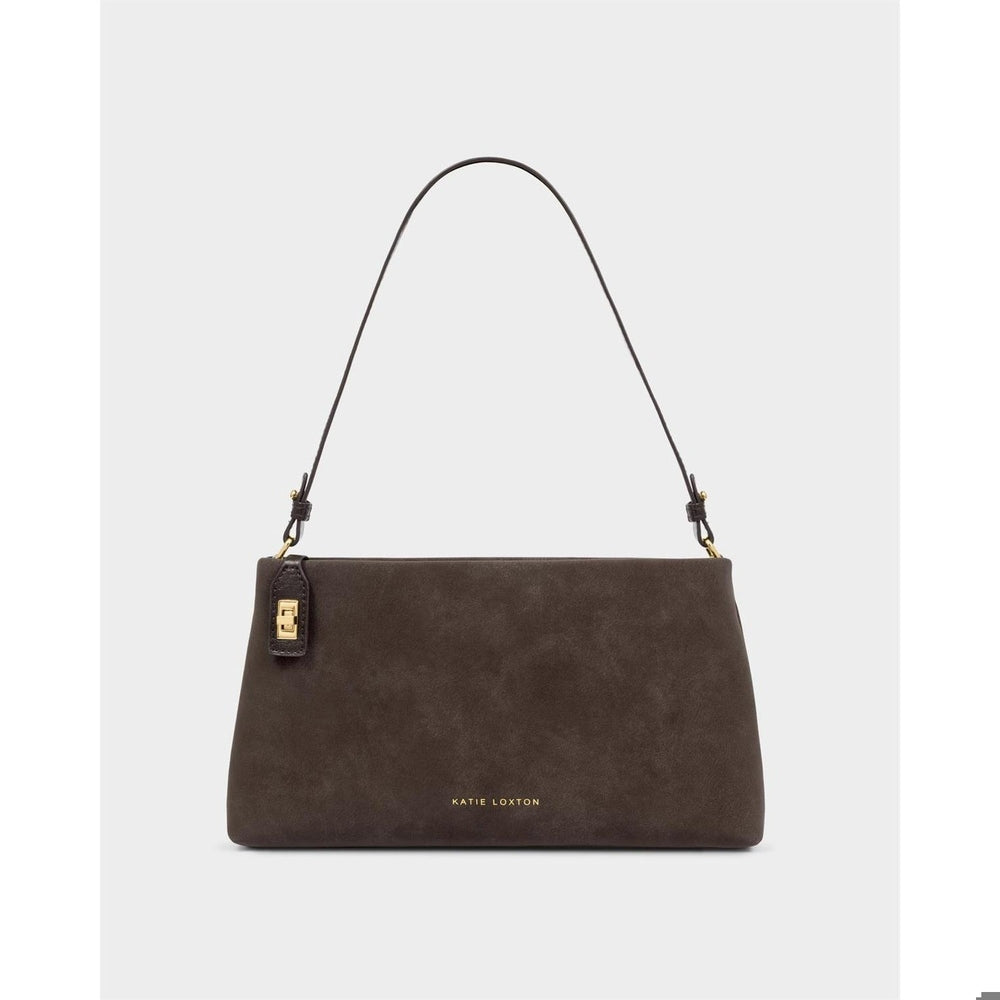 Vegan suede handbag by Katie Loxton featuring a chocolate brown rectangular silhouette with an adjustable thin strap and gold-tone metal hardware against a neutral grey background