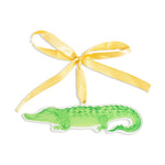 Green alligator acrylic ornament with a yellow ribbon