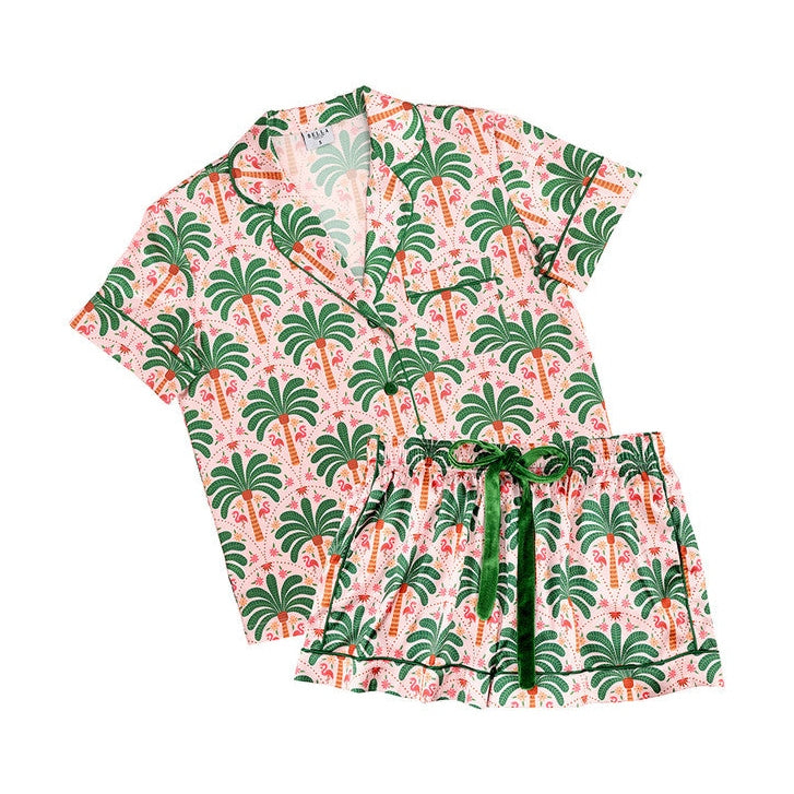 Pajama set with palm tree pattern on a white background