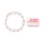 Beaded bracelet with a pink tag labeled 'Beaded Blondes' on a white background