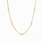 Gold chain necklace with five evenly spaced white pearls