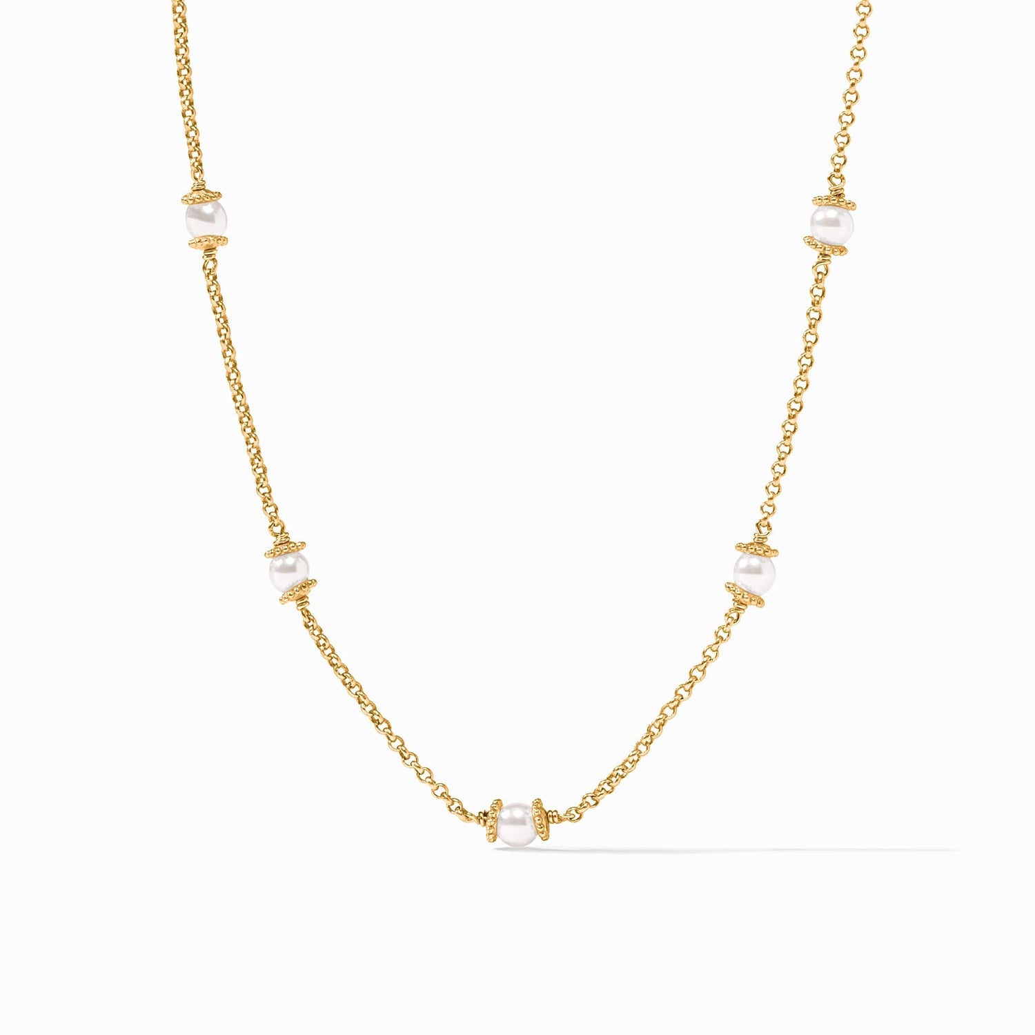 Gold chain necklace with five evenly spaced white pearls