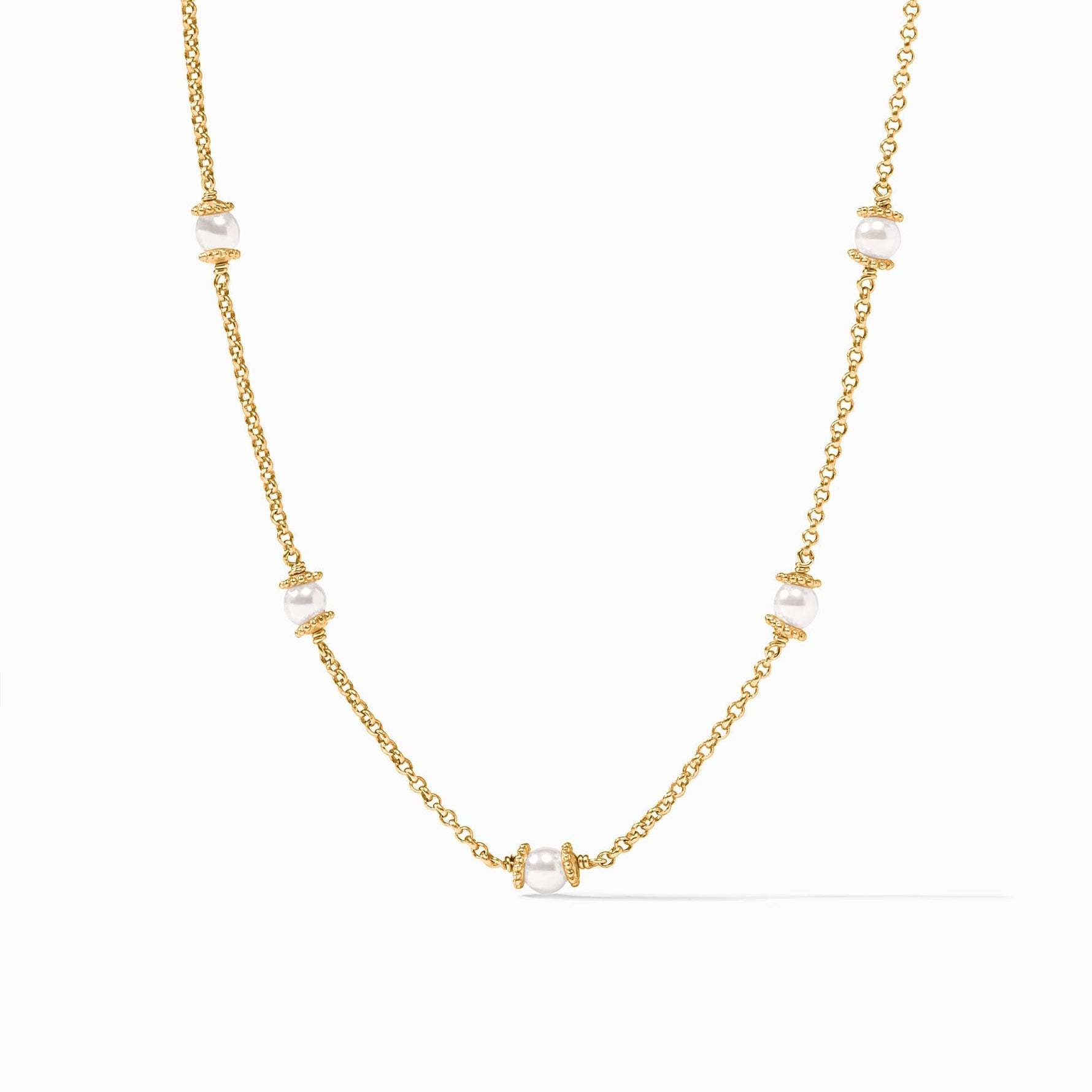 Gold chain necklace with five evenly spaced white pearls