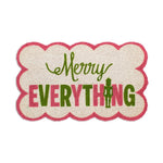 Scalloped edge doormat with Merry Everything text and a nutcracker icon
