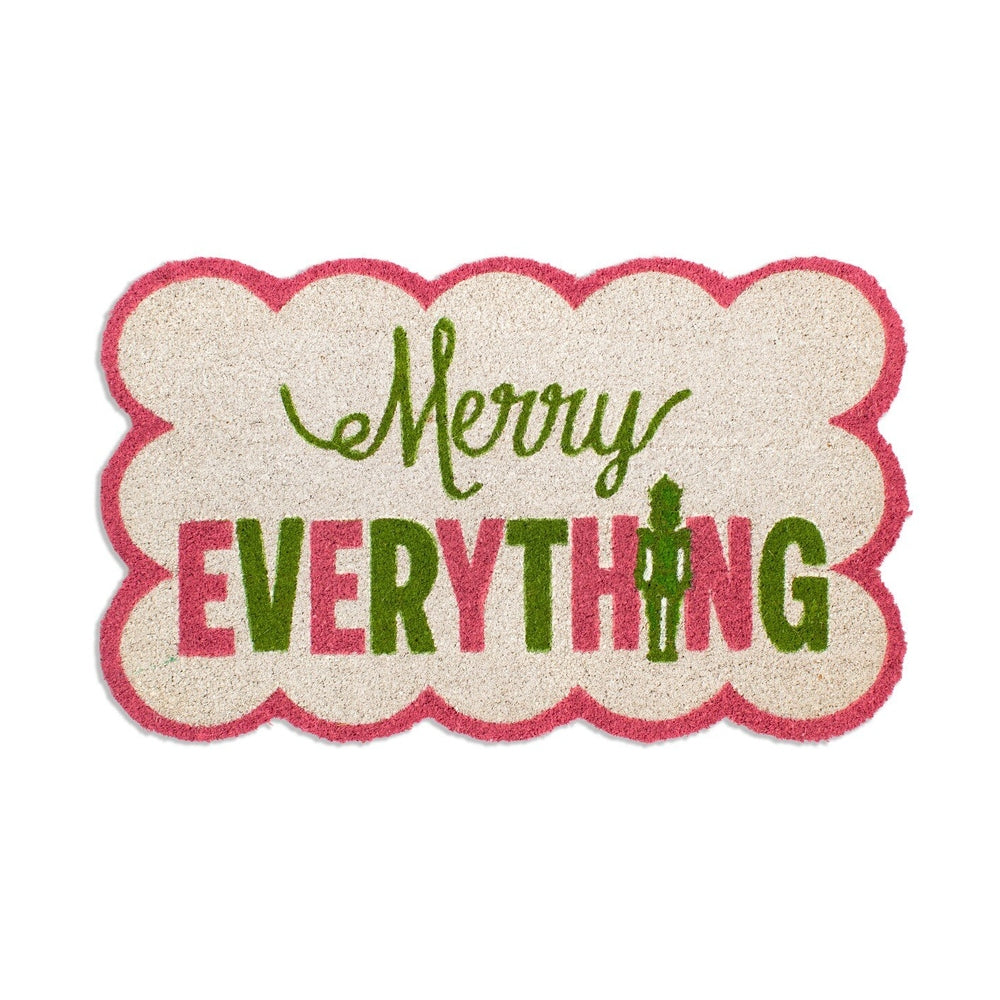 Scalloped edge doormat with Merry Everything text and a nutcracker icon