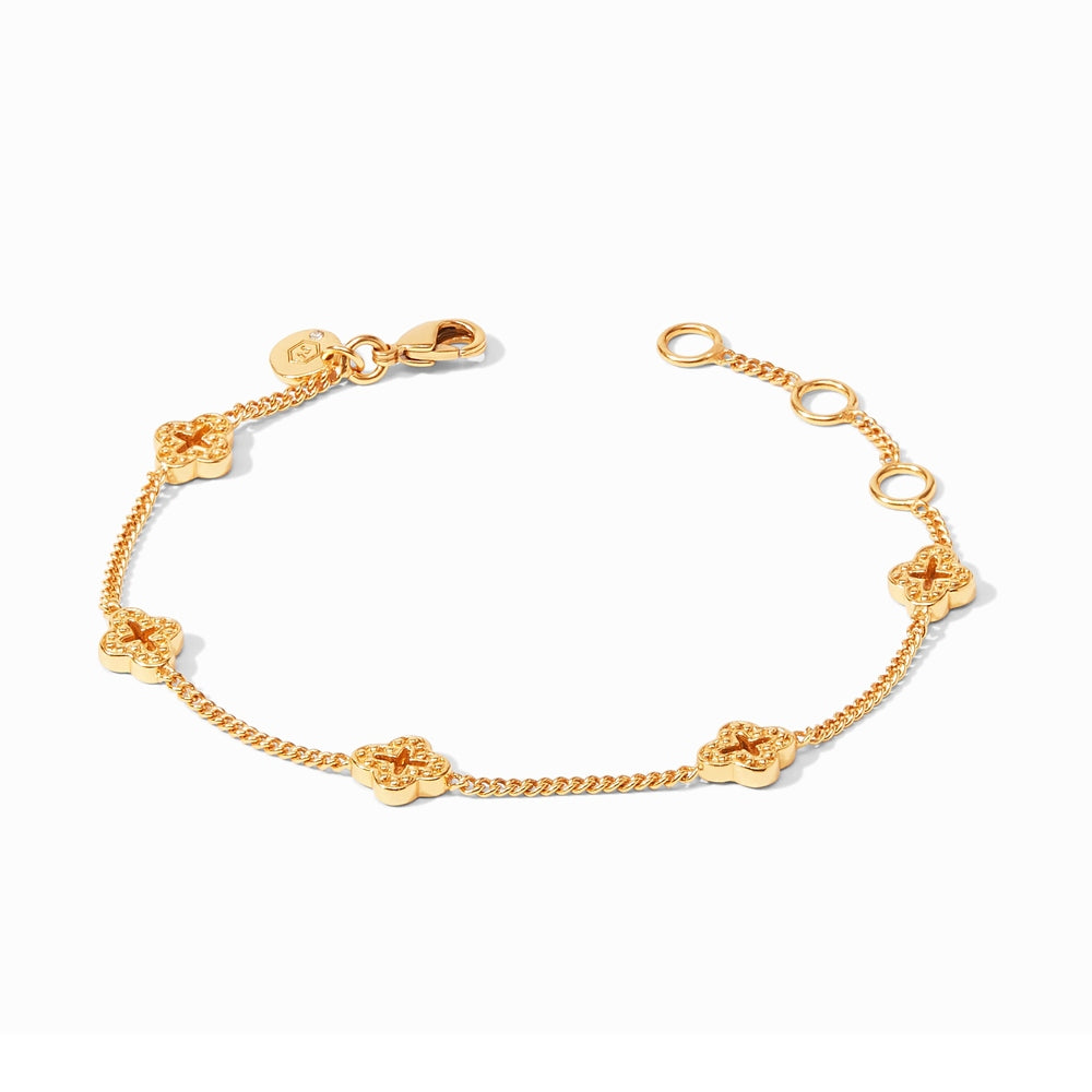 Gold chain bracelet with four clover shaped charms