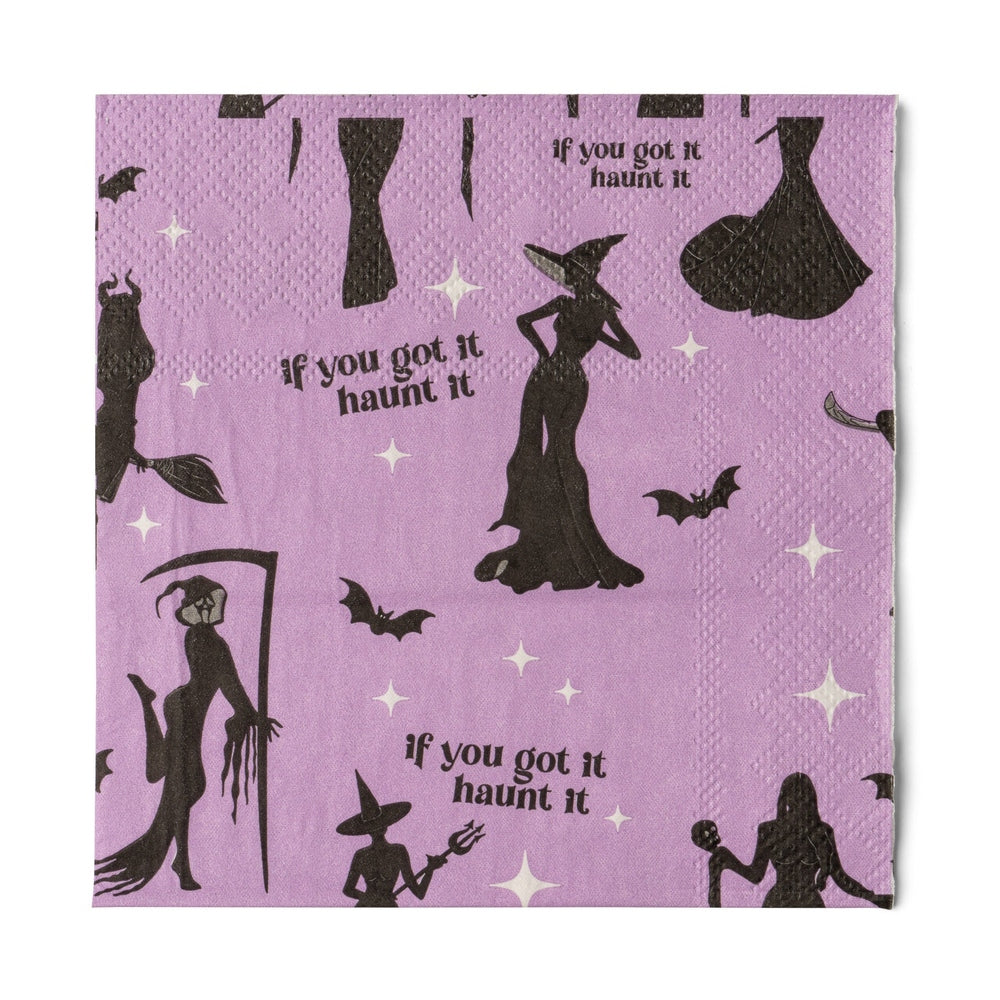 Purple cocktail napkin with black witch silhouettes, bats and "If you got it haunt it"